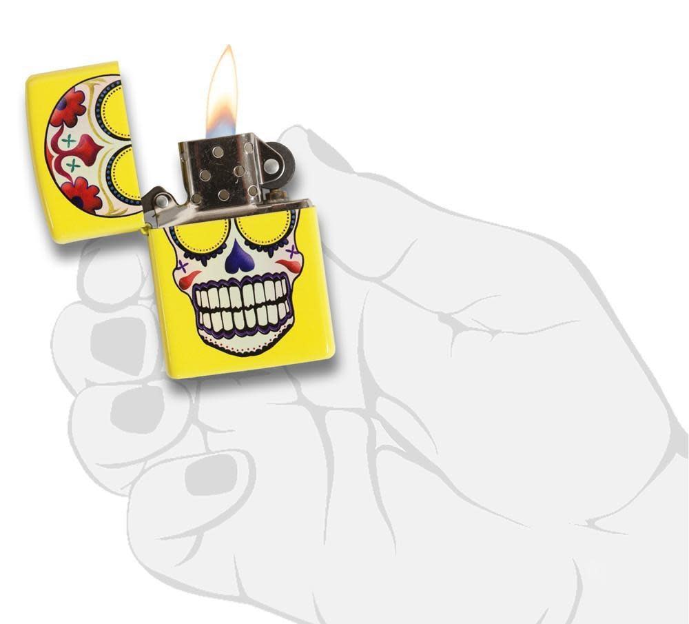Front view of the Day of the Dead, Neon Yellow Lighter in hand, open and lit